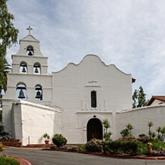 Mission San Diego de Alcalá, a white Spanish colonial church with a bell tower
