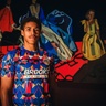 A young man wearing the Black History Month Cambridge United shirt