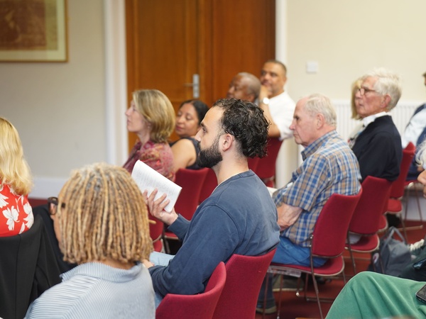 Audience members applauding following Dr Mark Tumbridge's seminar on slavery, indentureship and migration in the Caribbean.