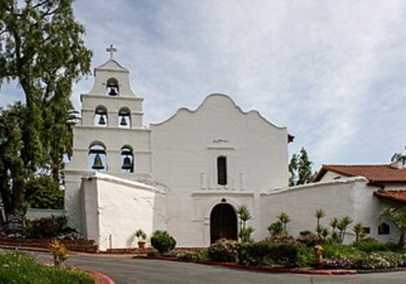 Mission San Diego de Alcalá, a white Spanish colonial church with a bell tower